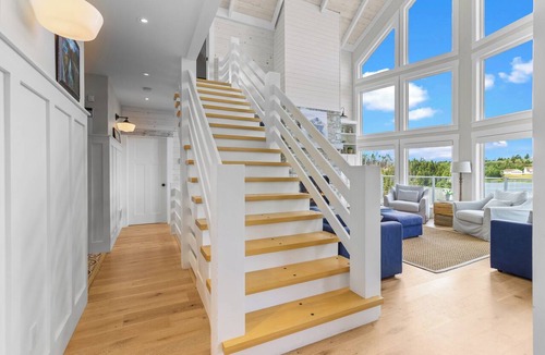 Whitbourne House | Where unforgettable weekends begin. Gather with family and friends in this spacious waterfront Lake house featuring a hot tub, stunning sunset views, and room for everyone to reconnect and celebrate.