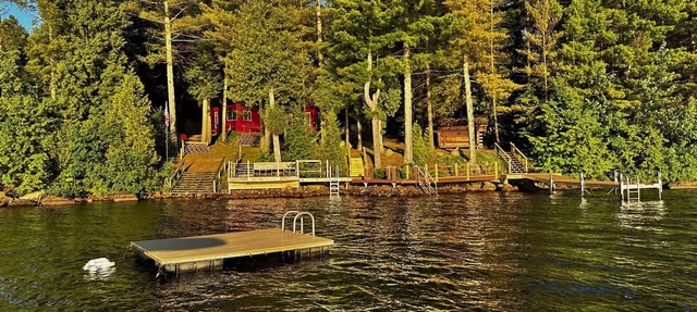 Direct waterfront overlooking forever wild forest on a hidden dead end street in Lyon Mountain