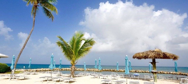 !GREAT LOCATION & VALUE! 7mile BEACH CONDO in a Resort setting on 7mile Beach in George Town