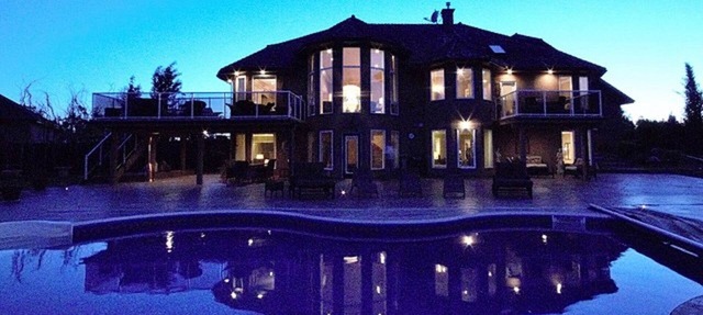 Luxurious Gated Estate With Salt Water Pool in Spruce Grove