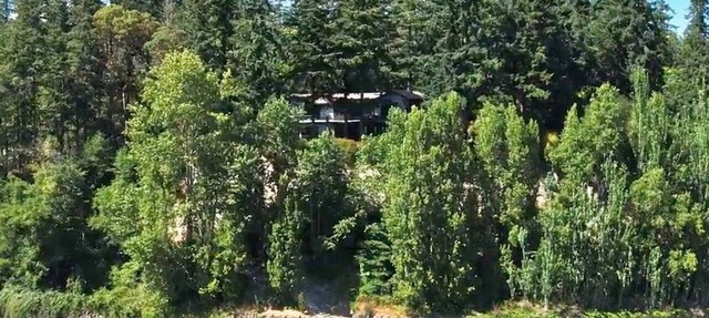 Luxury Waterfront Estate with Private Beach in Poulsbo