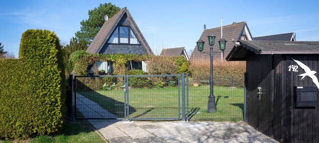 Modern house with roof only—near the beach—fenced-in yard * in Butjadingen
