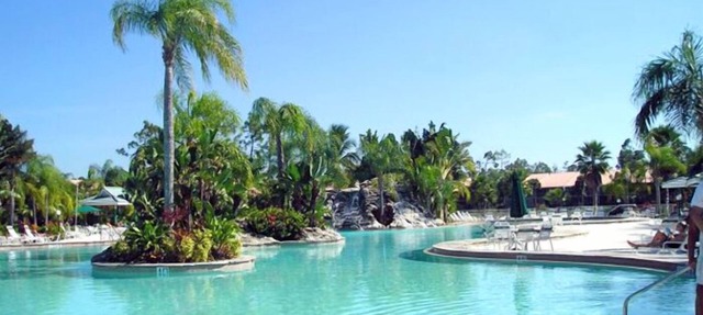 PARADISE FOUND! LAKEFRONT FIRST FLOOR CONDO IN TROPICAL FALLING WATERS in Naples