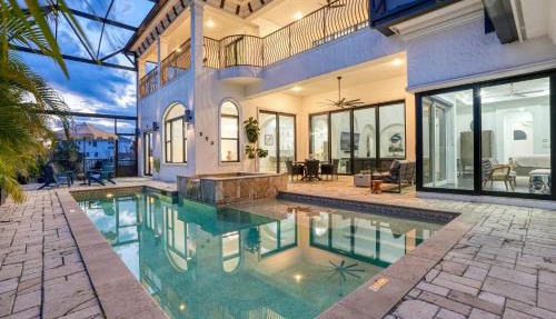 Spacious Luxury Waterfront Retreat with Pool & Spa in Naples