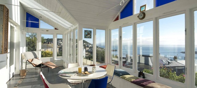 Spectacular panoramic sea views of Mounts Bay from this light filled home in Mousehole