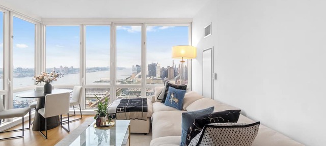 Corner 1BR Skyline and River Views Floor to Ceiling Windows Walk to Times Sq in New York